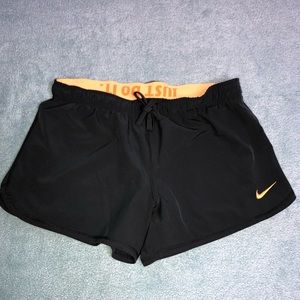 **SOLD** NIKE dark grey and light orange Dri-fit shorts